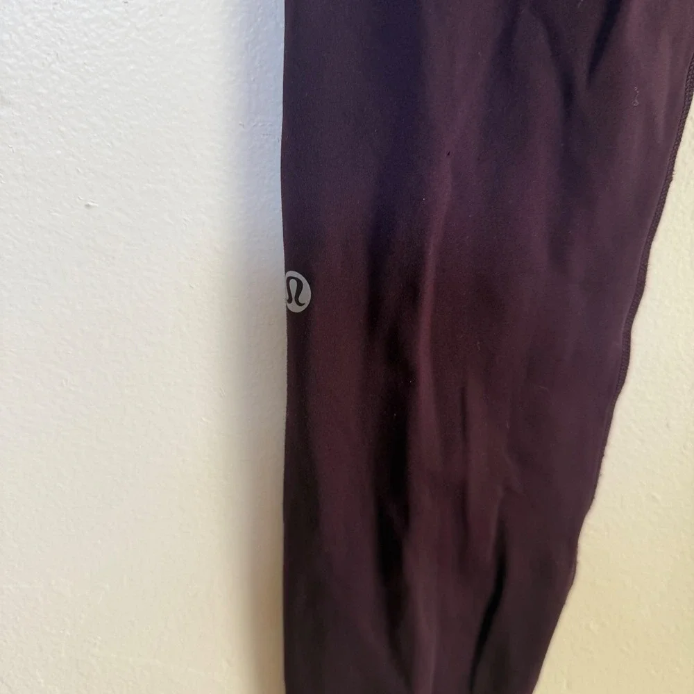 Lululemon Fast and Free High Rise Reflective Pocket Leggings Size 4 Plum